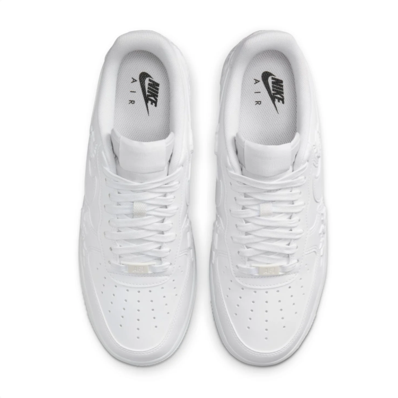 Nike White Low-Top Sneakers with Raised Rose Details