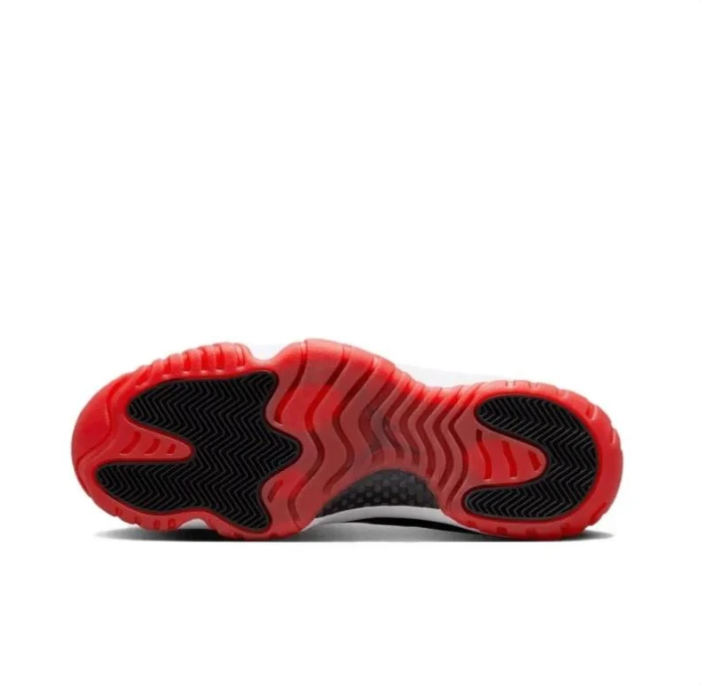 Jordan Black Low-Top Sneakers with Glossy Panels and Red Outsole