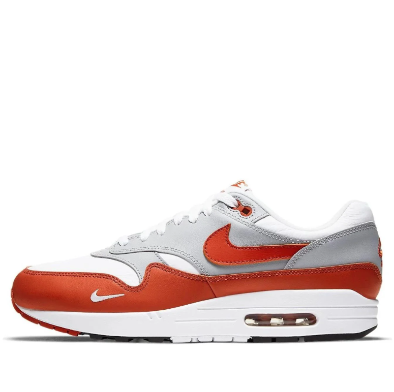 Nike Air Max White and Grey Sneakers with Burnt Orange Accents