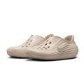 Nike Beige Slip-On Clogs with Vent Holes and Wave-Ridged Sides